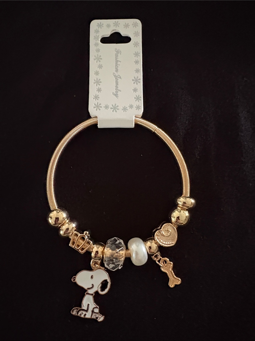 Gold-Tone Snoopy Bracelet with White Enamel Dog Charm and Pearl Accent